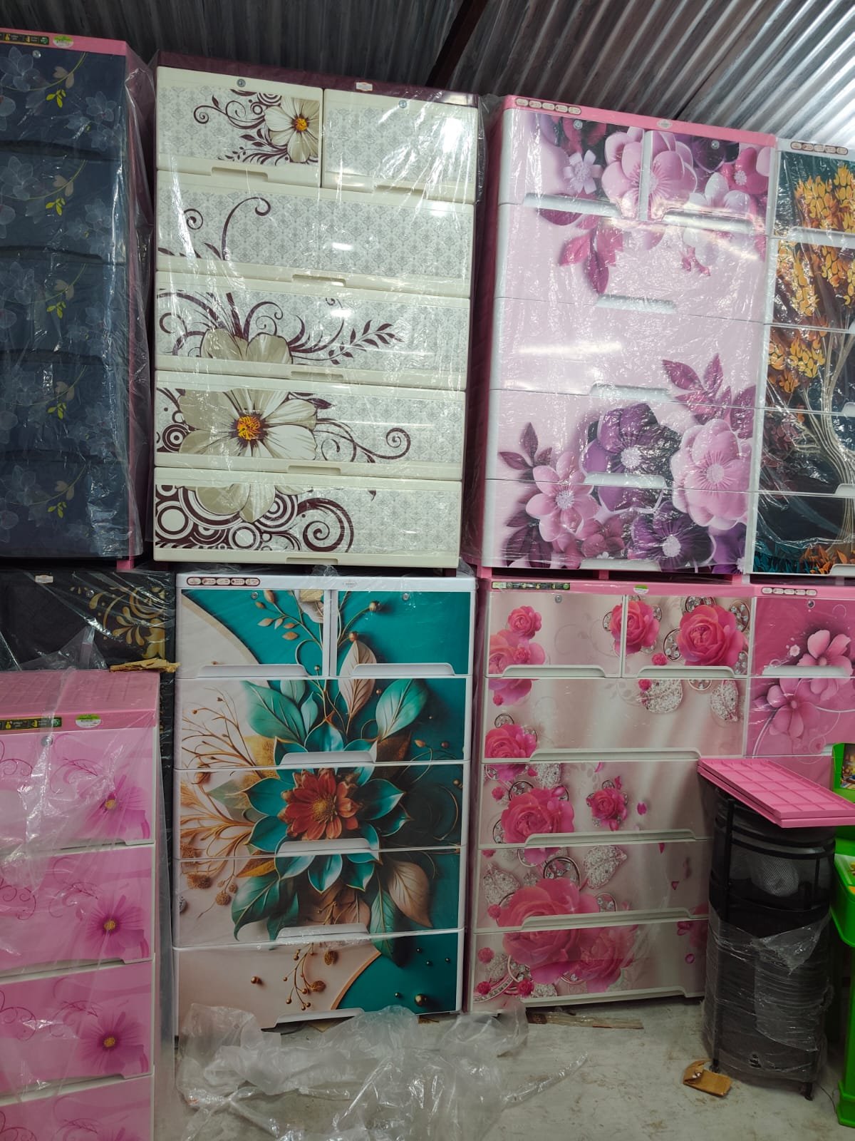 Floral wardrobes and drawer cabinets in several colours